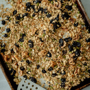 Cherry Walnut Granola on a baking sheet