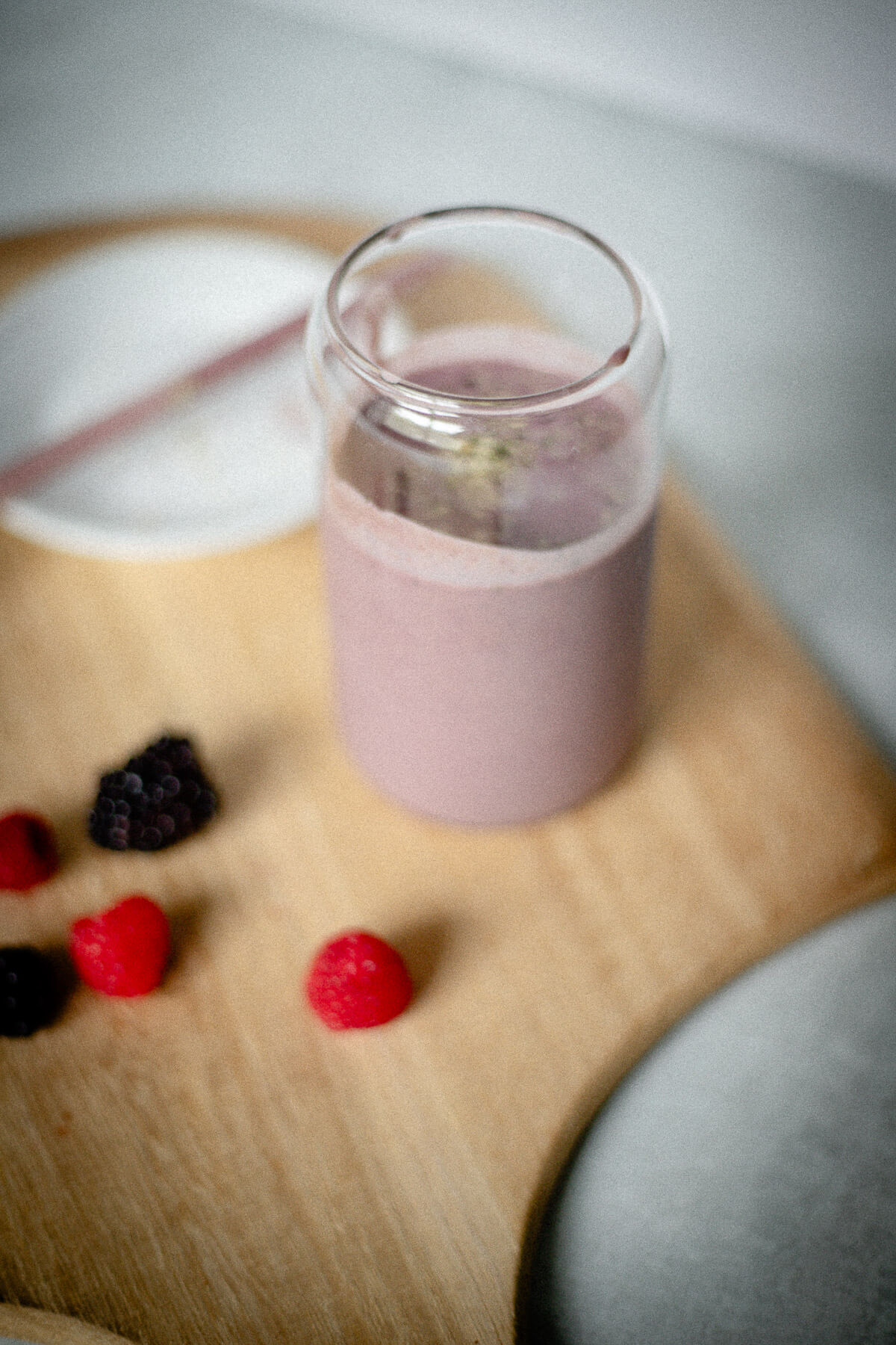 gut friendly triple berry smoothie with hemp seeds topping