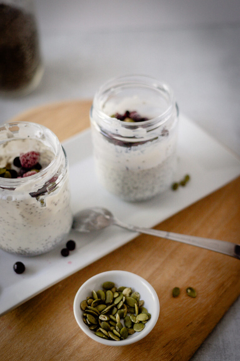 instant chia pudding with pumpkin seeds and berries on top