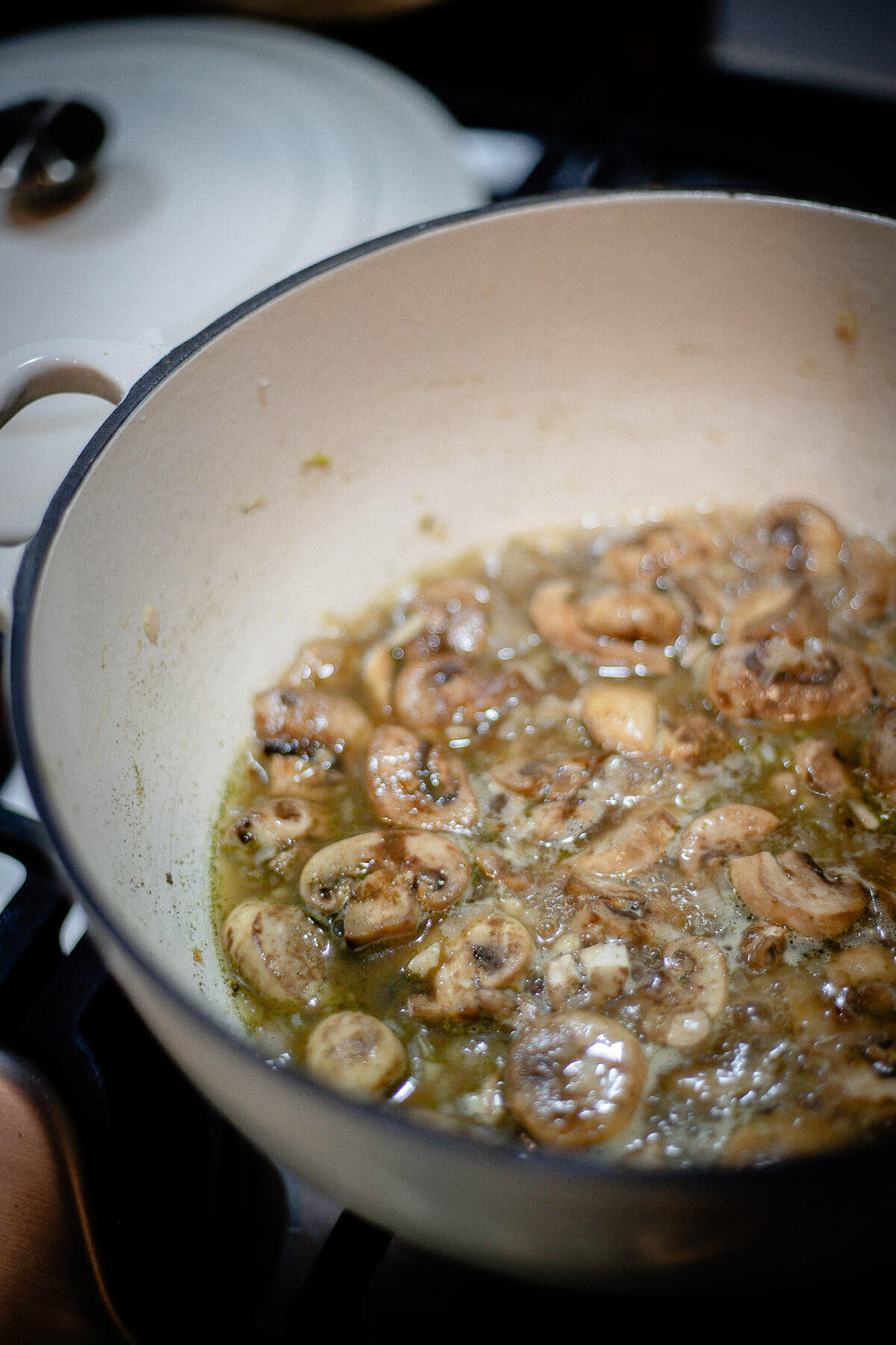 Cooking mushrooms in a pot