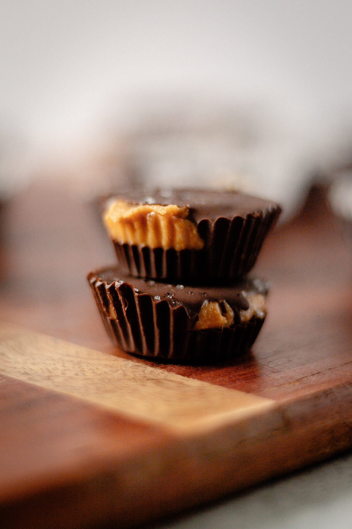 close up view of homemade chocolate peanut butter cups with sea salt topping