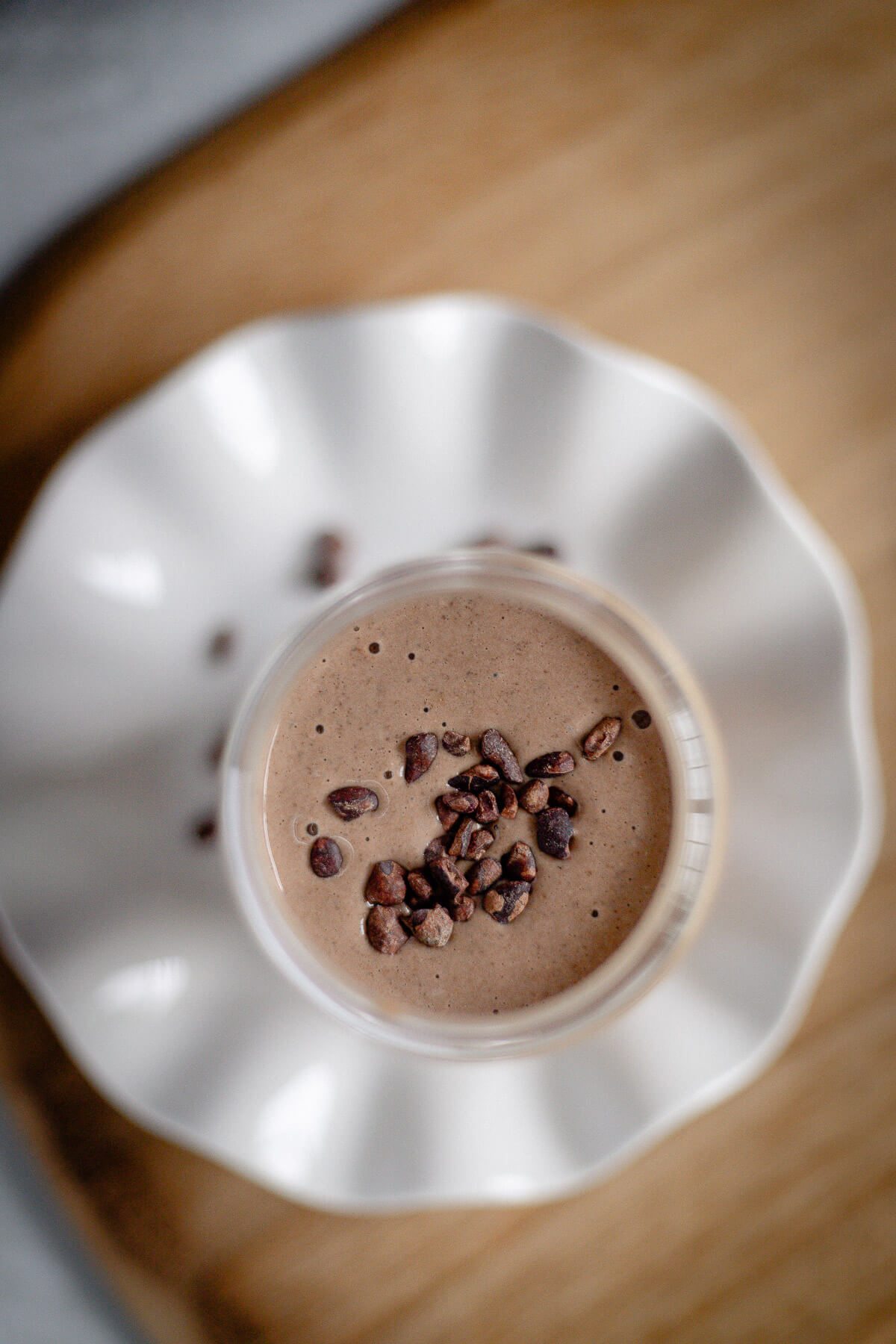 Chocolate Peanut Butter Protein Smoothie double chocolate protein smoothie with cacao nibs on top