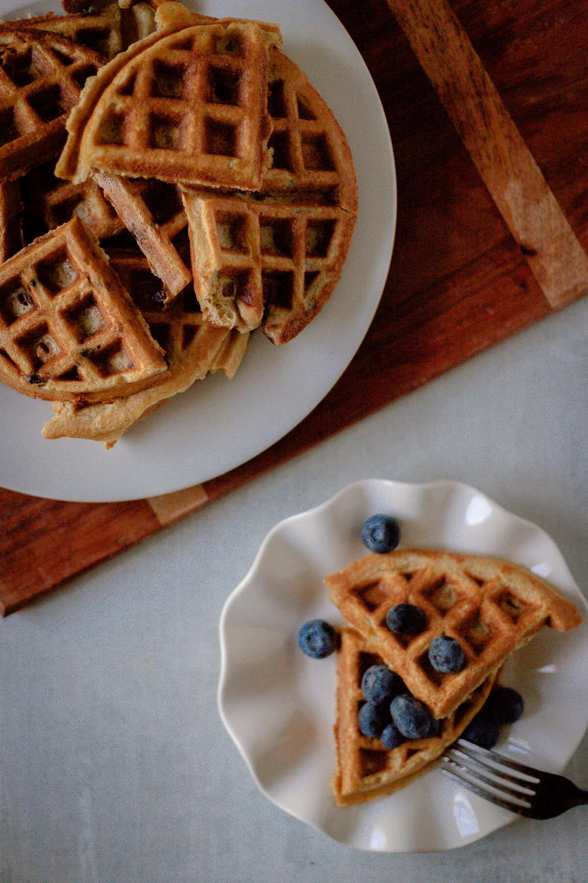 Gluten Free Protein Waffles stack of gluten free high protein waffles with some blueberries on top