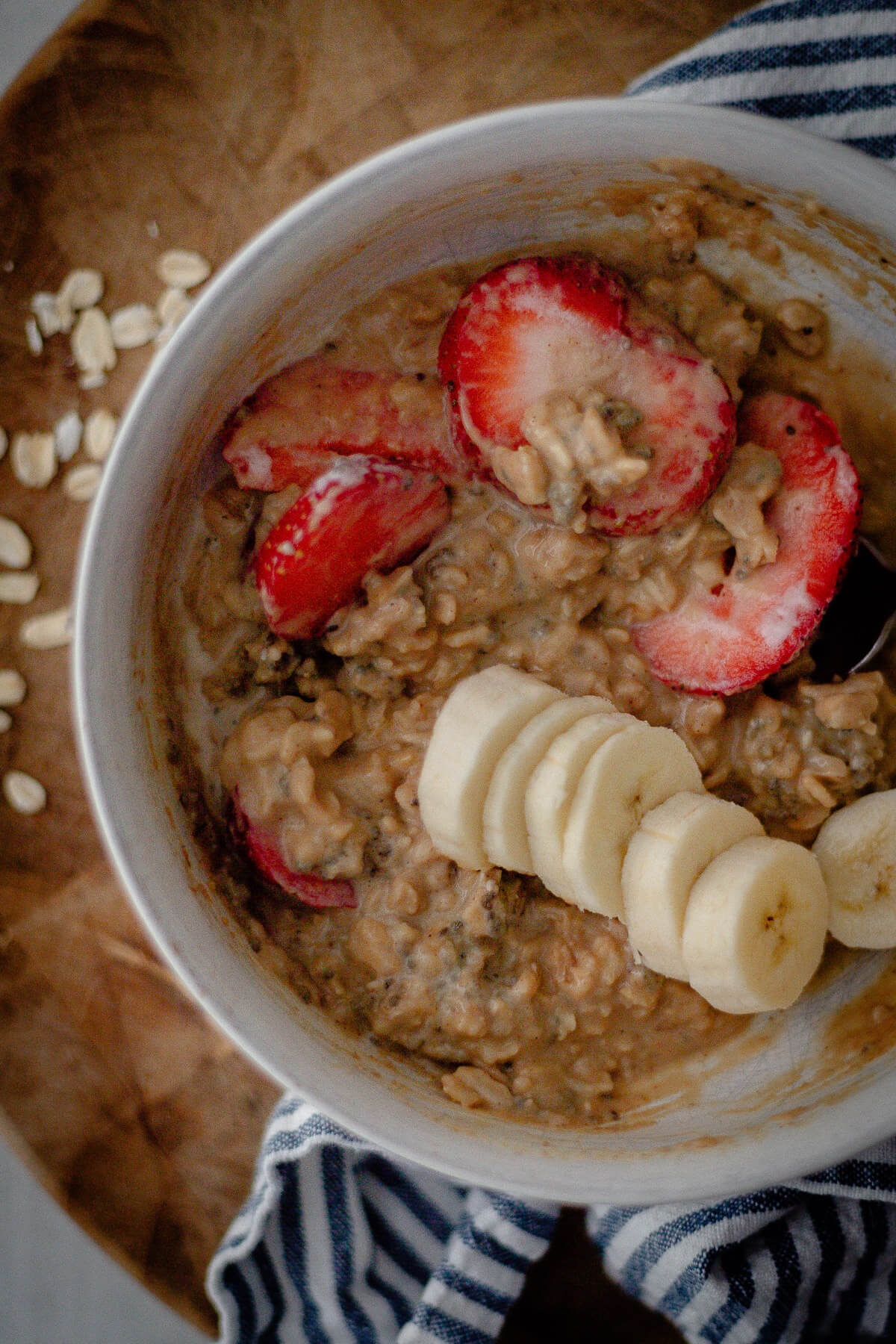 peanut butter protein oatmeal with strawberries and banana
