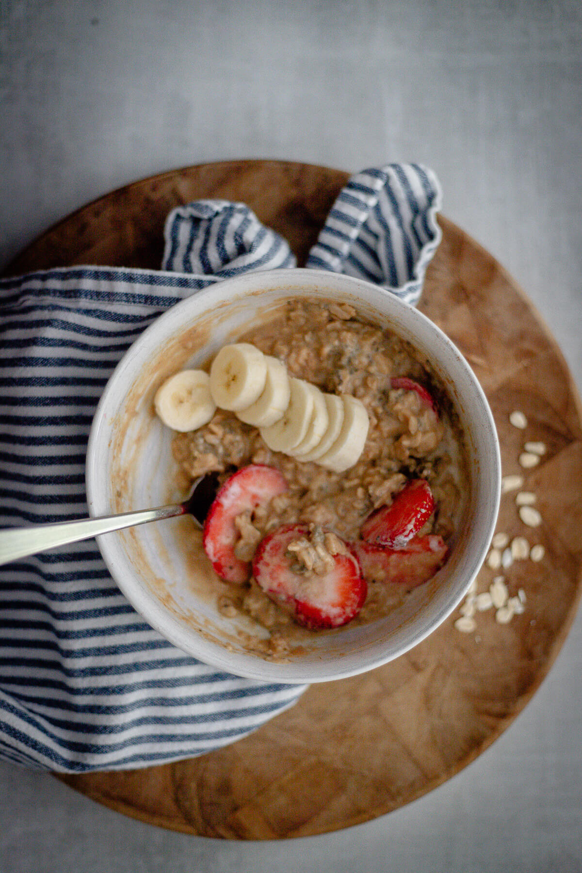 peanut butter protein oatmeal with strawberries and banana