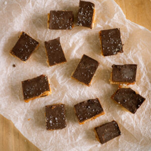 overhead view of peanut butter chocolate date bars - like a healthier chewy snickers bar