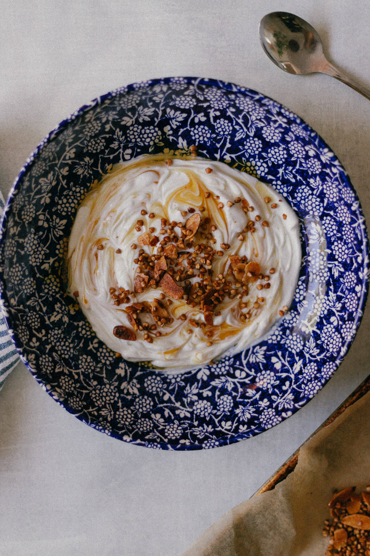 greek yogurt with honey and topped with buckwheat groat almond granola